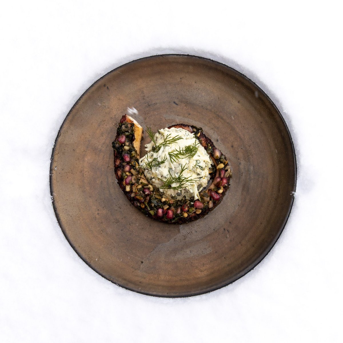 Gourmet plate by Chef Elie Fishmann on artisanal dish in the snow - IMA Val d'Isère Restaurant